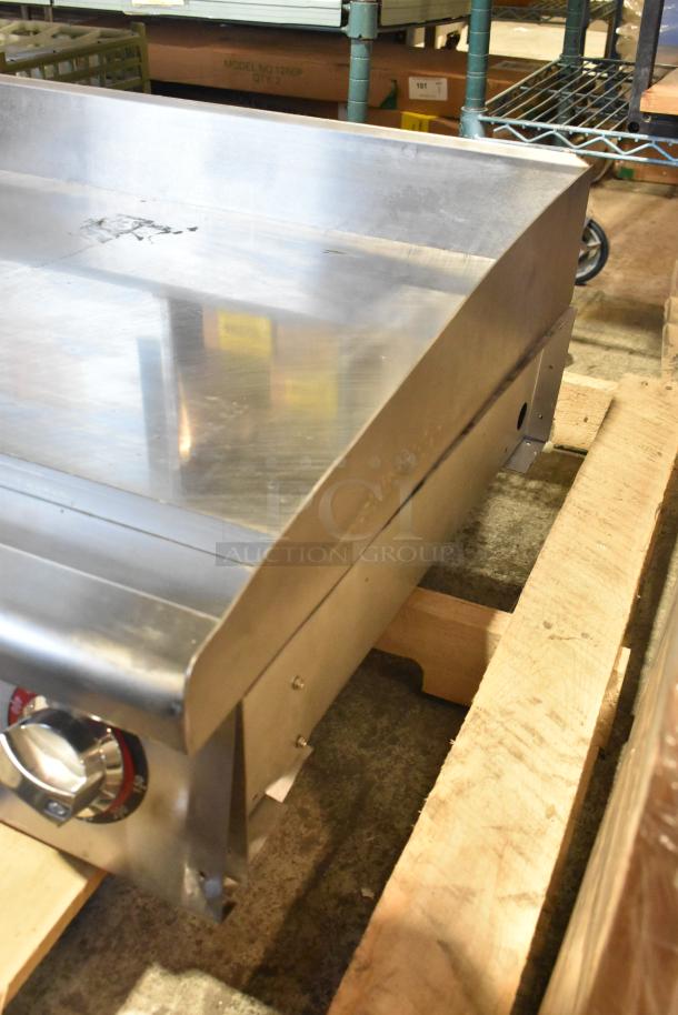 Brand new Star Max stainless steel commercial countertop gas griddle, flat top, with control knobs, excellent condition.