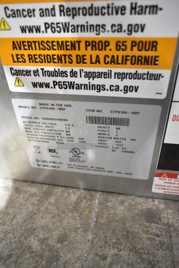 Delfield CTP8160-NBP stainless steel countertop refrigerated rail, 115V, 1 phase, with safety and specification labels.