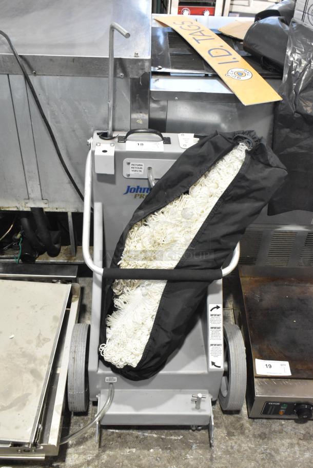 Johnson Wax Professional JWP-1572 metal floor waxing machine, featuring handle, wheels, and mop storage. In good condition.