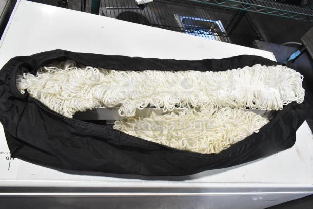 Johnson Wax Professional JWP-1572 metal floor waxing machine, displayed with a black cover and visible white mop head.