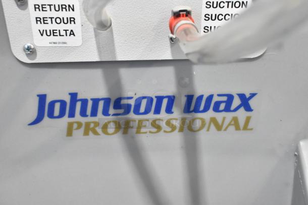 Johnson Wax Professional JWP-1572 floor waxing machine label, showcasing branding. Visible suction and return labels.