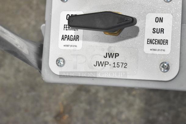 Johnson Wax Professional JWP-1572 floor waxing machine control panel with on/off switch and model label.