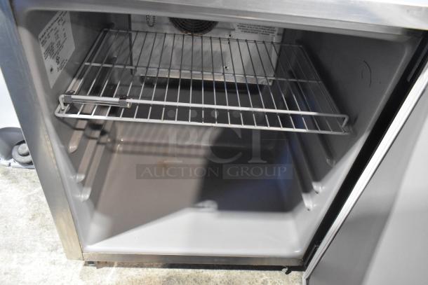 2019 Delfield 406P-STAR2 undercounter cooler, stainless steel, single door, with interior shelf, on commercial casters.