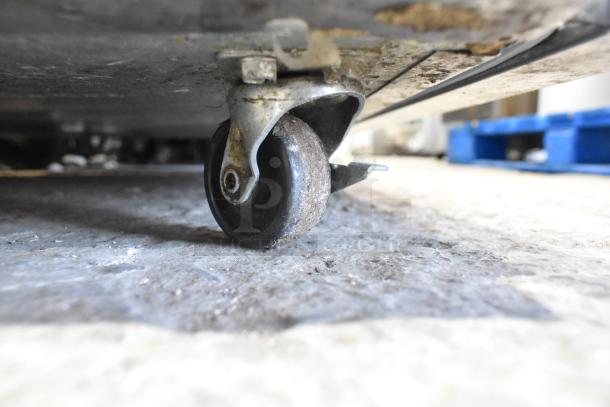 2019 Delfield 406P-STAR2 undercounter cooler caster detail; stainless steel, commercial grade, 115V, 1 phase.