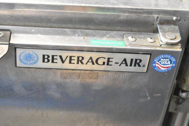 Beverage Air UCR34Y stainless steel commercial cooler, 2 doors, on casters. Labels indicate made in USA and refrigeration use.
