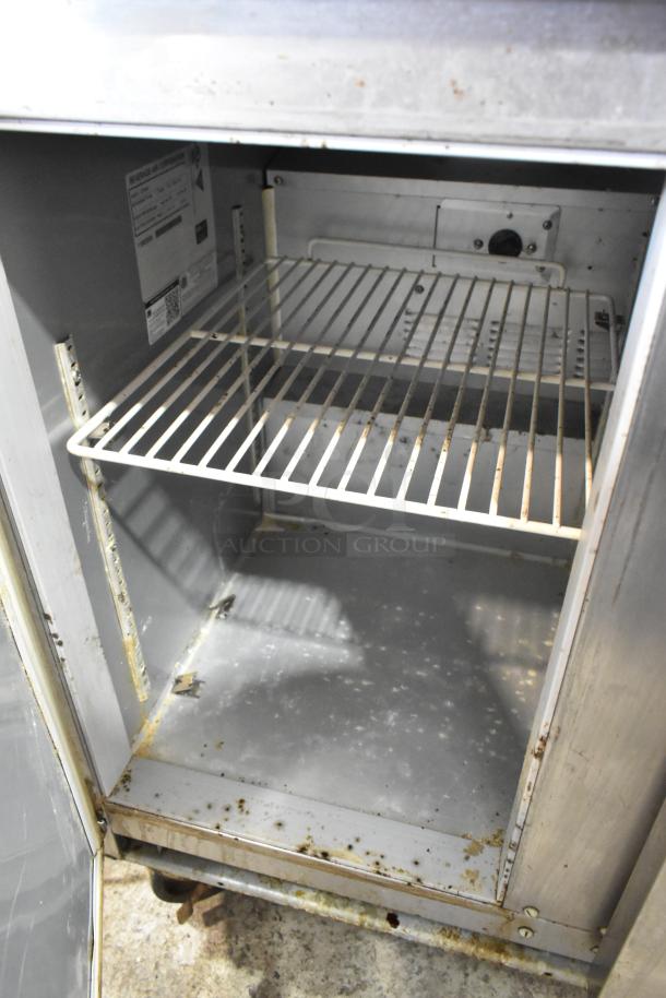 Beverage Air UCR36A stainless steel 2-door undercounter cooler on casters, 115V, 1 phase, interior wear visible.