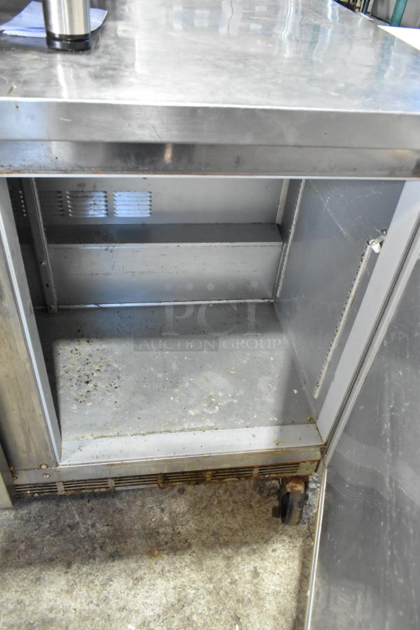 Beverage Air WTR48A stainless steel 2-door undercounter cooler, on casters. 115 volts, 1 phase. Visible wear inside.