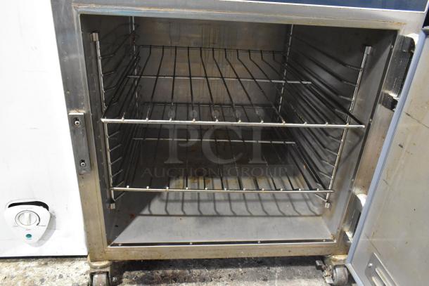 2019 Alto Shaam 750-S stainless steel commercial undercounter heated holding cabinet with racks, on casters. 115V, 1 phase.