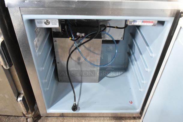 2018 Delfield ND21RS00 stainless steel nitrogen beverage dispenser with 2 tap beer tower, interior view showing wiring and components.