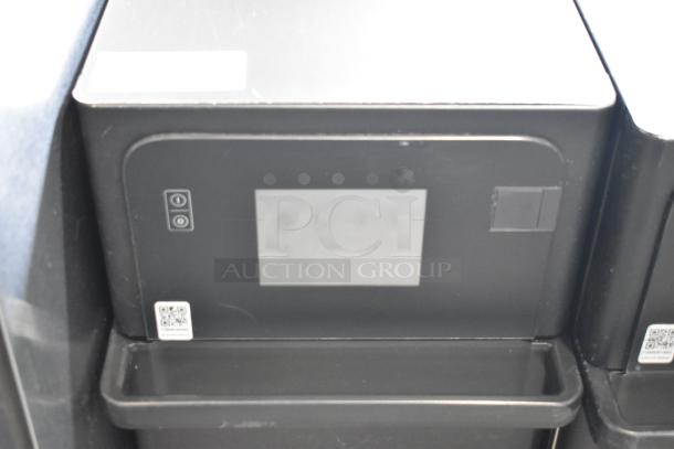 2022 Merrychef eikon e2S rapid cook oven, electric, 208/240V, 1 phase. Black metal, touchscreen interface, commercial use.