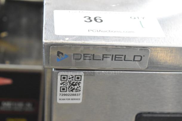 2019 Delfield 406P-STAR2 stainless steel undercounter cooler with single door, commercial casters, 115V, 1 phase.