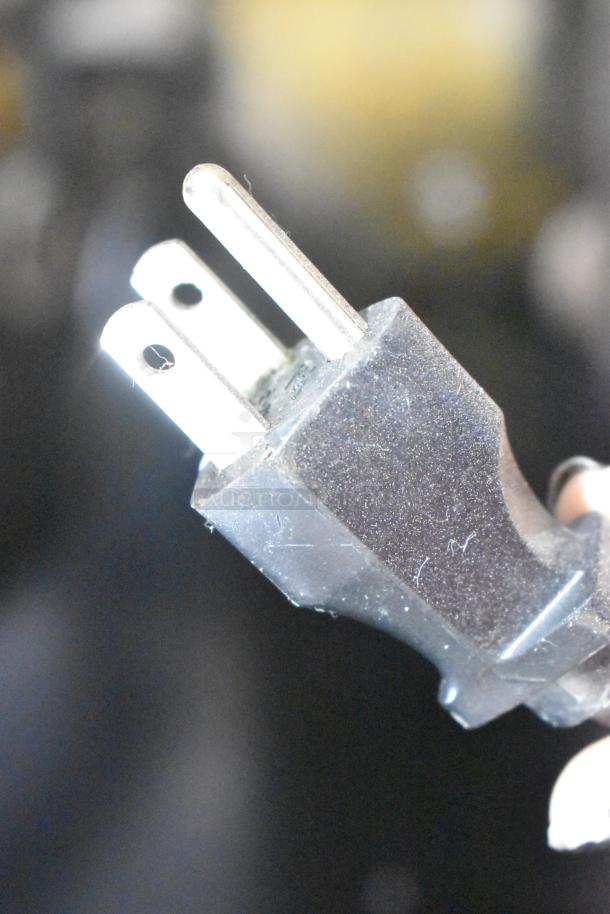 Close-up of a three-pronged power plug for the Cecilware ME10EN commercial coffee urn. 120 Volts, 1 Phase.