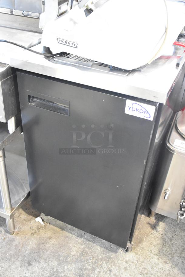 Yukon YDD-1 stainless steel kegerator, 115 volts, on commercial casters, black exterior, visible brand label.