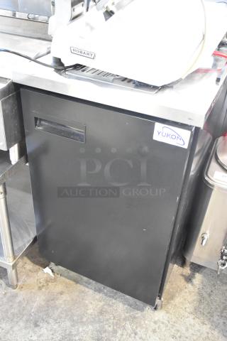 Yukon YDD-1 stainless steel kegerator, 115 volts, on commercial casters, black exterior, visible brand label.