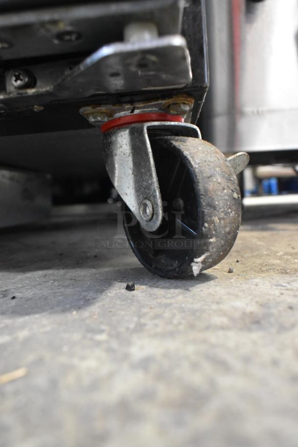 Yukon YDD-1 stainless steel kegerator on commercial caster, showing wheel condition. 115 volts, 1 phase.