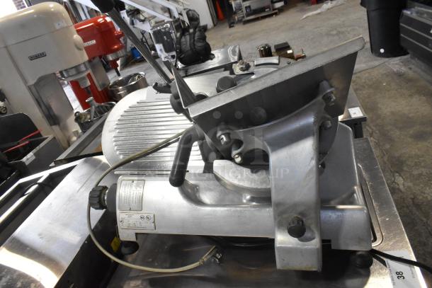 Hobart 2612 stainless steel countertop meat slicer with blade sharpener, 115 volts, 1 phase, in used condition.