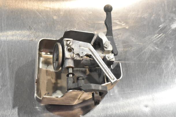 Hobart 2612 stainless steel meat slicer component, featuring metallic controls and levers, used condition.
