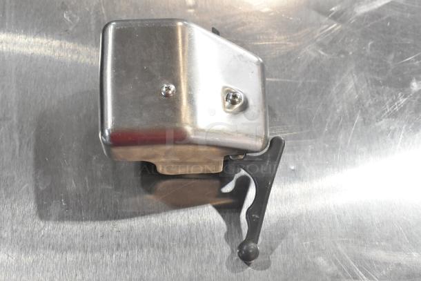 Hobart 2612 stainless steel meat slicer with blade sharpener, 115 volts, shown in good condition on a countertop.