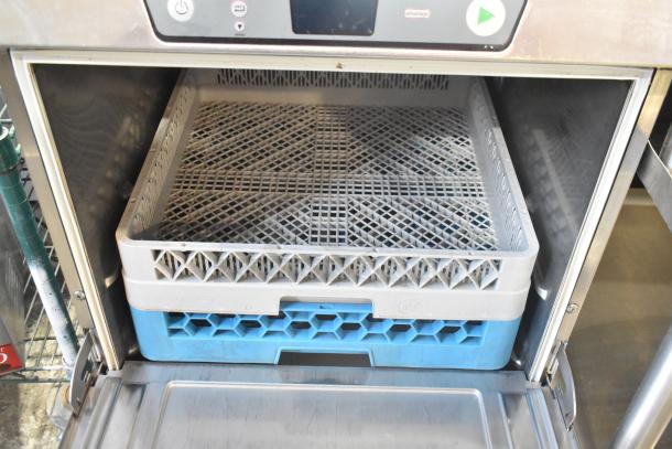 2022 Hobart LXER stainless steel commercial dishwasher, undercounter model, shown open with rack inside.