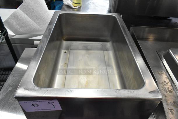 Winco FW-S500 stainless steel commercial food warmer; visible minor wear; 120 volts, 1 phase; auction tag number 43.