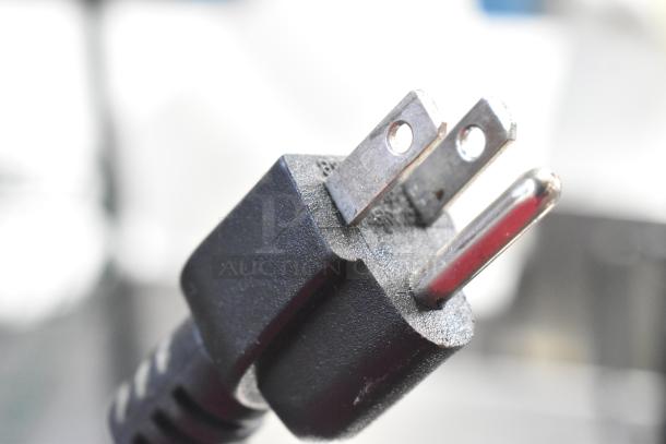 Close-up of a power cord plug for Omega M1000 Metal Countertop Single Head Drink Mixer. 120 Volts, 1 Phase.