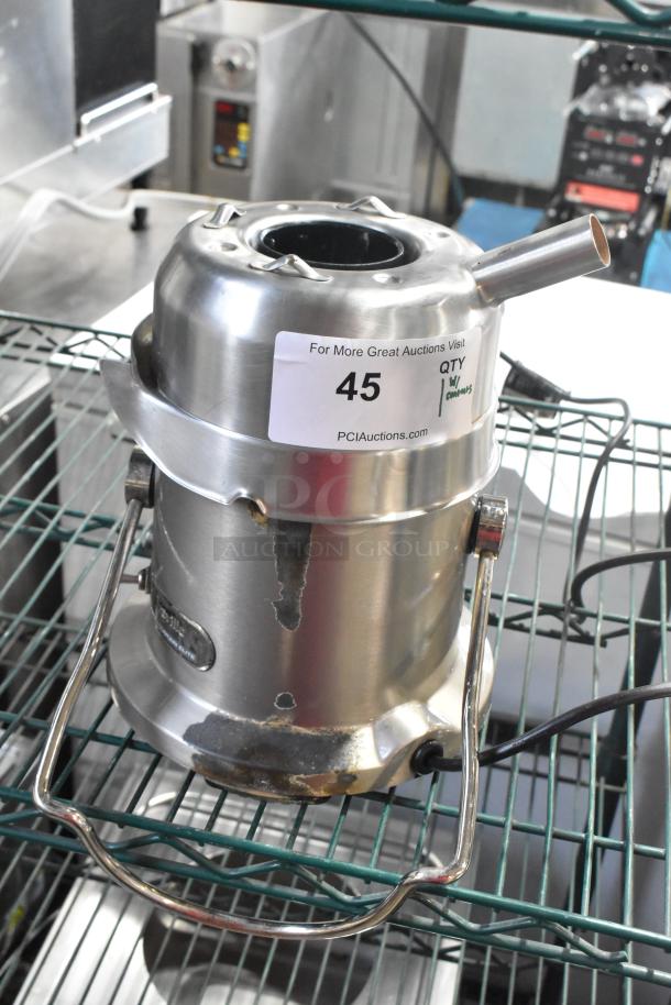 Breville stainless steel commercial countertop juicer, 115V, 1 phase, used condition, visible wear, auction label attached.