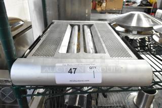 Metal Bug Zapper, 115 Volts, 1 Phase, shows slight wear. Auction tag labeled "47, QTY 1" from PCIAuctions.com.