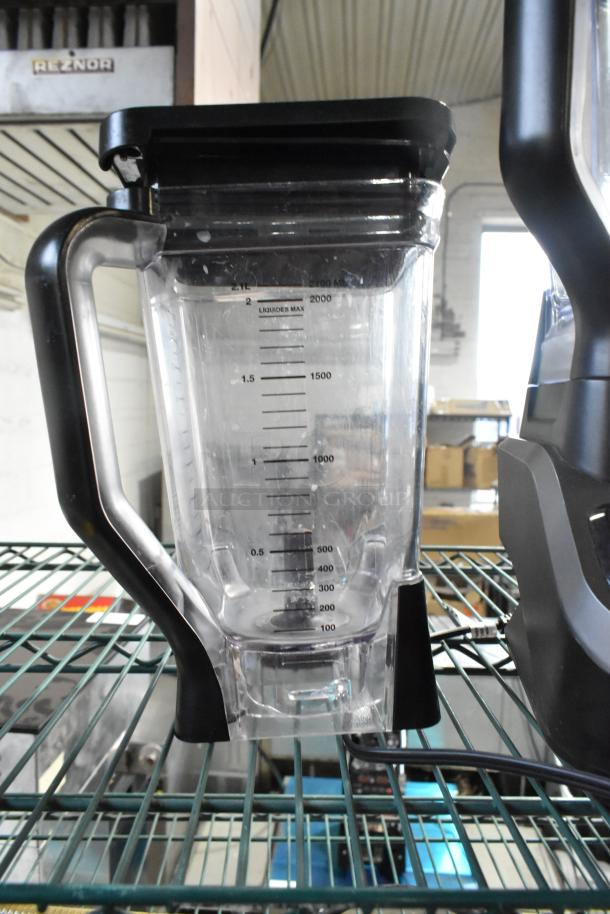 Ninja BL610 countertop blender with extra pitcher, 120 volts, 1 phase, clear markings, in good condition.