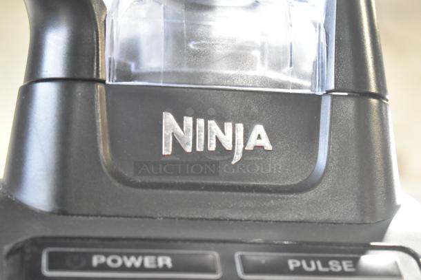 Ninja BL610 Metal Countertop Blender with logo. Includes extra pitcher. 120V, 1 Phase. Power and pulse buttons visible.