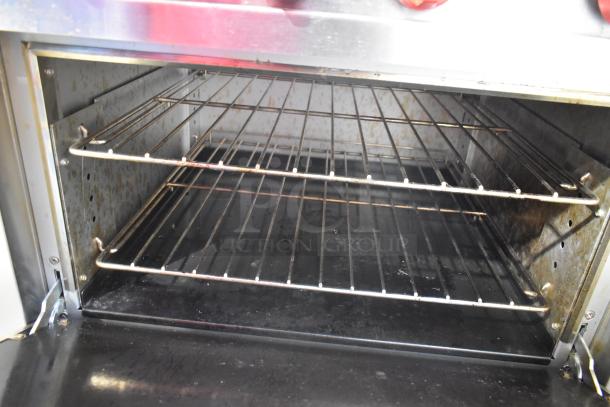 2024 Cookline CR36-6 stainless steel commercial oven interior with two wire racks. Used condition.