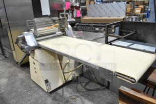 Seewer Rondo S commercial reversible dough sheeter, metal build, floor model, in good used condition.