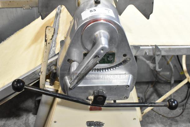 Seewer Rondo S Metal Commercial Reversible Dough Sheeter; floor style, used condition, with control lever and visible labeling.