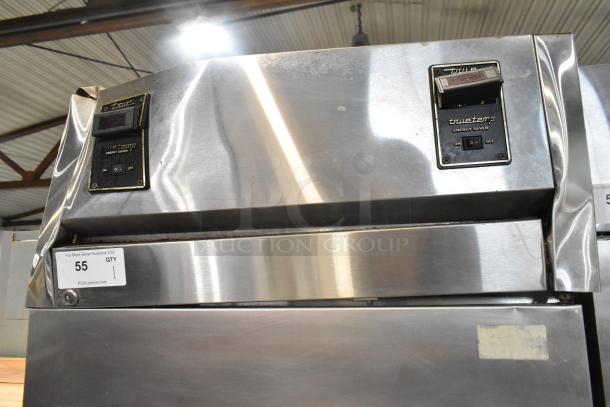 True TA1DT-2HS stainless steel commercial reach-in cooler/freezer with two half-size doors on casters. Model TA1DT-2HS, 115V, 1-phase.