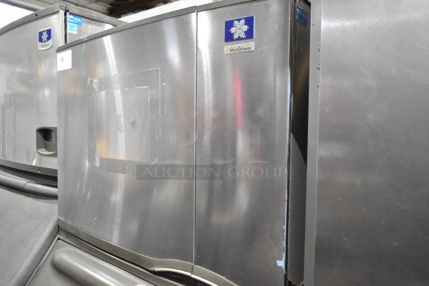 Manitowoc SY0504A stainless steel ice head on B570 bin, 115V, 1-phase, commercial use. Visible logo and label. Good condition.