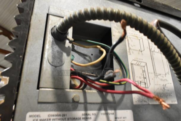 Manitowoc ID0606W-261 ice head with visible wiring, serial number 110172166, attached to a S570 bin. 208-230 volts, 1 phase.