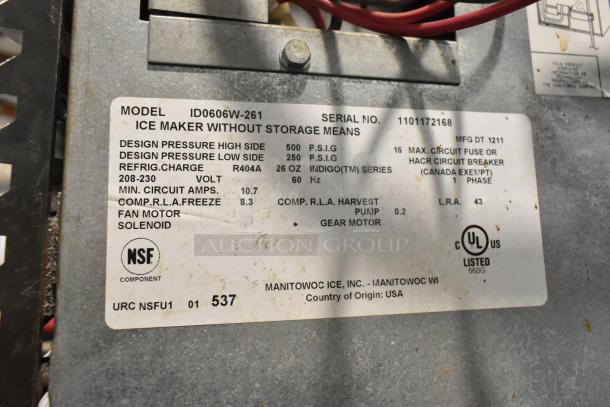 Stainless steel Manitowoc ID0606W-261 ice maker on S570 bin. 208-230V, 1 phase. Features include R404A refrigerant, NSF certified.