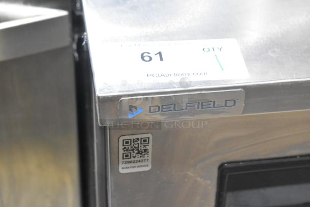 2020 Delfield 406P-STAR2 undercounter cooler with stainless steel finish, nameplate, and QR code. Commercial casters included.