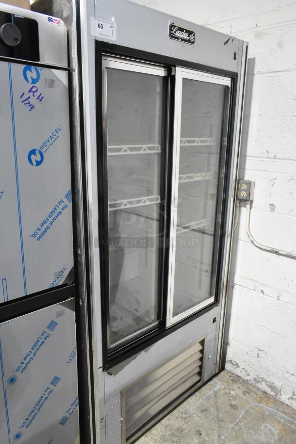 Leader LS38 SC metal 2-door reach-in cooler merchandiser, 115 volts, 1 phase, with shelf space, in commercial condition.