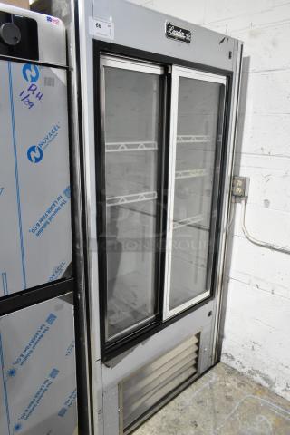 Leader LS38 SC metal 2-door reach-in cooler merchandiser, 115 volts, 1 phase, with shelf space, in commercial condition.