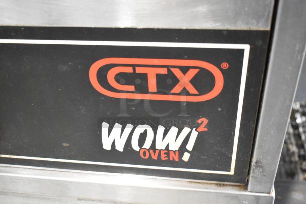 2 Middleby Marshall CTX DZ33I stainless steel conveyor pizza ovens, electric, 208V, on commercial casters, 2021 model.