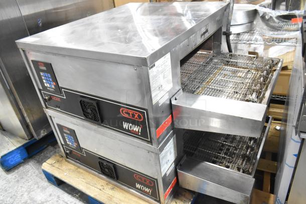 Two 2021 Middleby Marshall CTX DZ33I stainless steel electric conveyor pizza ovens on commercial casters, 208 volts.