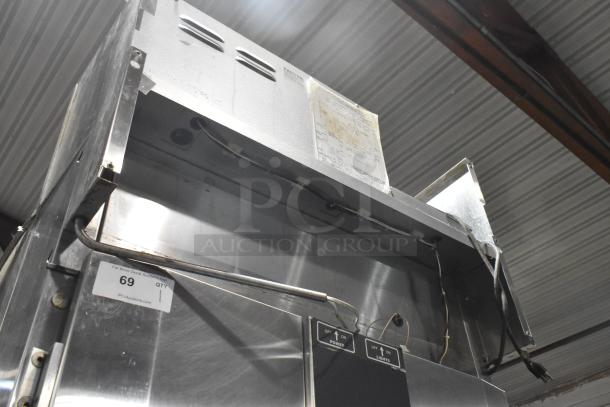 Baxter stainless steel commercial electric roll-in rack proofer, showing switches and wiring; item in used condition.