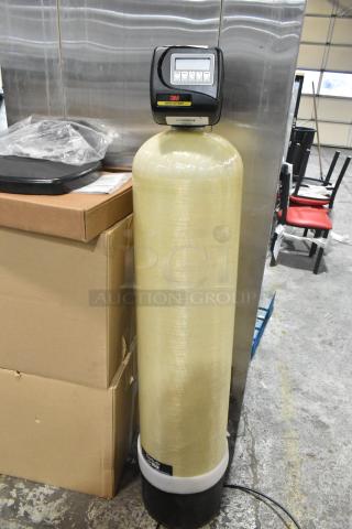 3M water softener tank, fiberglass construction, digital control head, labeled "Water Softener," excellent condition.