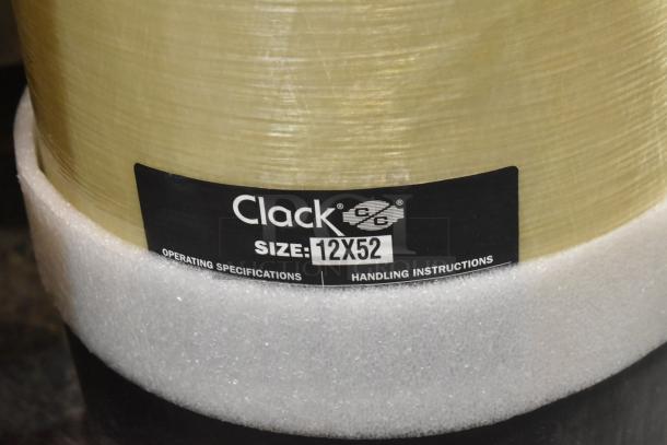 3M Water Softener Tank with Clack label, size 12x52, featuring operating specifications and handling instructions.