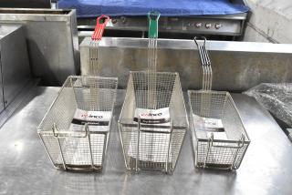 14 brand new Winco metal fry baskets, models FB-30/FB-05/FB-25, with labeled handles, scratch and dent condition.