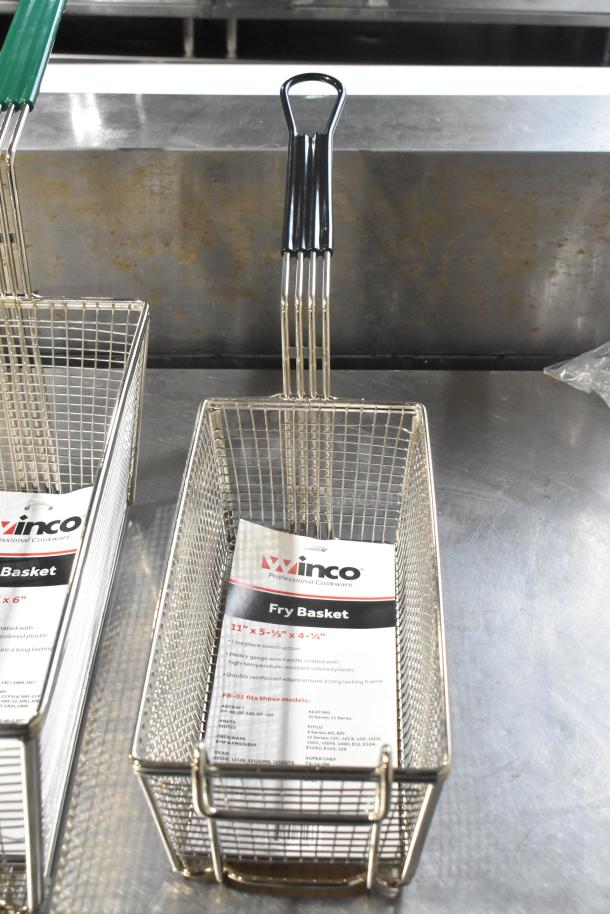 14 new scratch and dent metal fry baskets, including Winco FB-30/FB-05/FB-25 models, with handle tags intact.