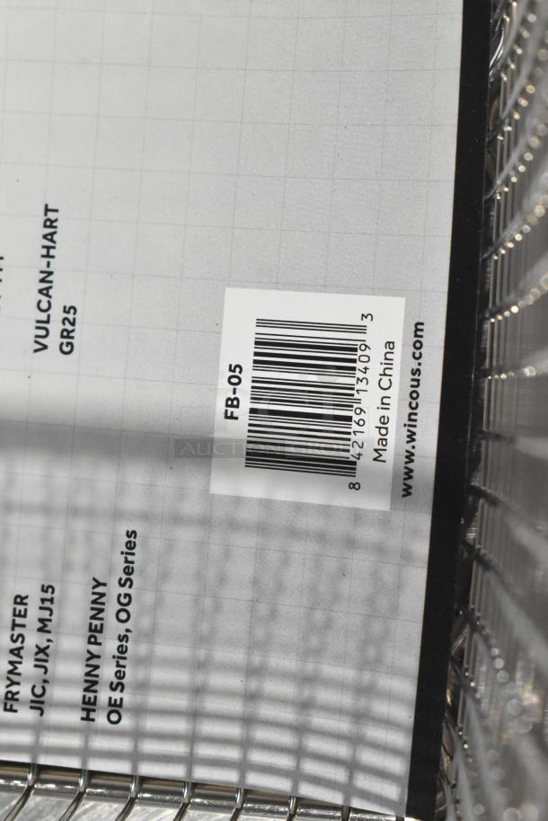 14 new scratch and dent metal fry baskets, Winco models FB-30, FB-05, FB-25, barcode reads FB-05, made in China.