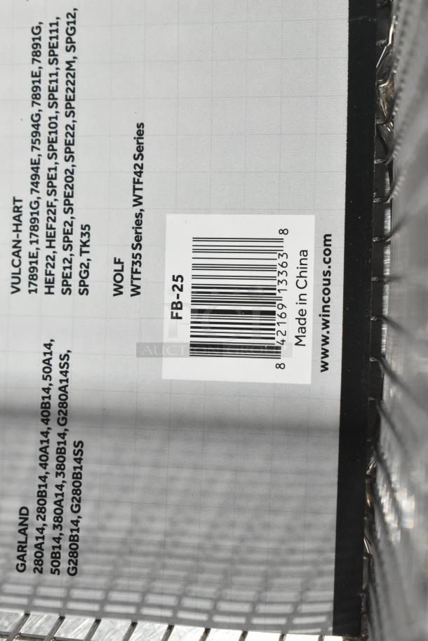 14 new scratch and dent metal fry baskets, models Winco FB-30/FB-05/FB-25, with barcode and "Made in China" label.