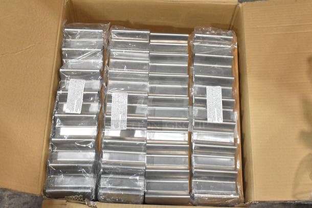 Box of brand new Tablecraft hot dog prep trays, sealed in plastic. Trays are stacked neatly in cardboard box, with labels visible.