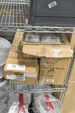 5 brand new items on a metal shelf, including Cambro 20LPHPC150 lid, Winco SPSCS pan cover, Cambro 10CWD135 tray.
